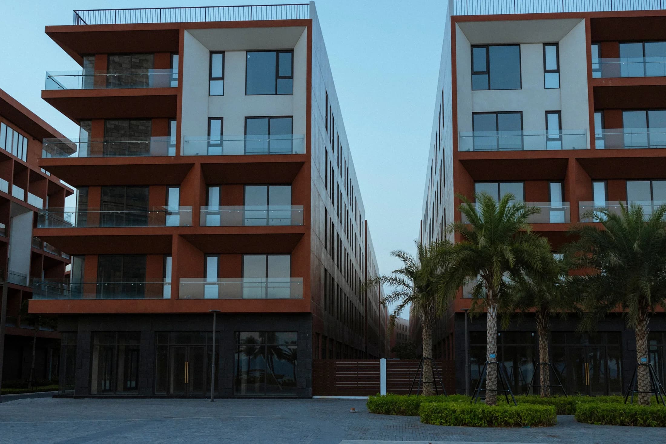 Apartment architecture framed by palm trees